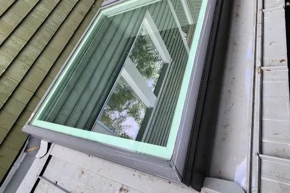 After professional window cleaning showing clear streak-free residential windows