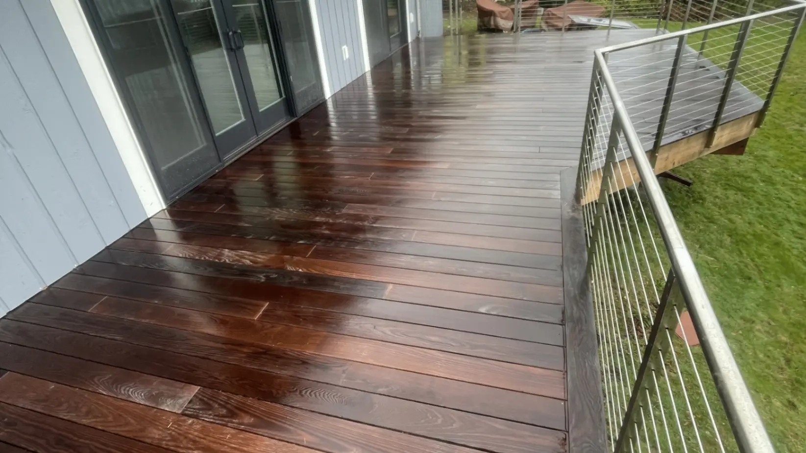 After professional pressure washing restored clean and bright wood deck surface in Bremerton