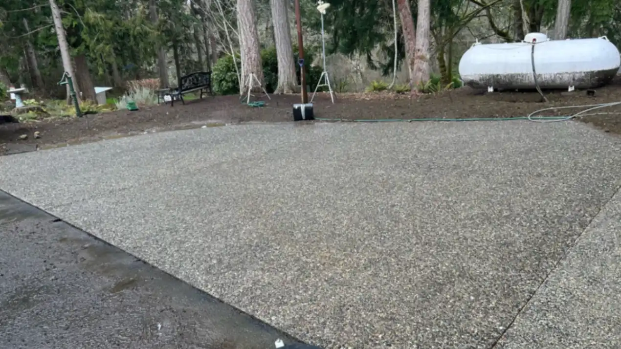 After professional pressure washing restored a clean concrete driveway in Bremerton