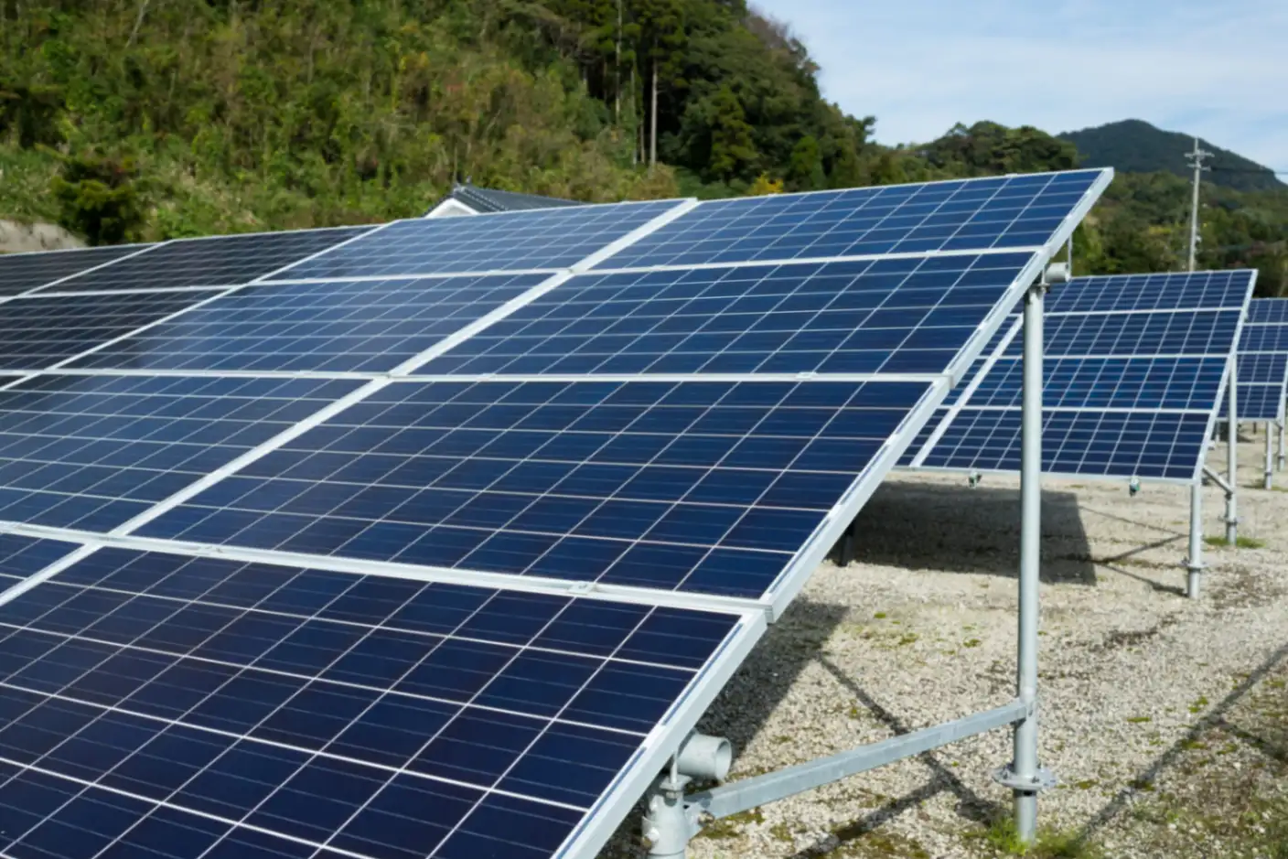 Ground-mounted solar panel array after professional cleaning