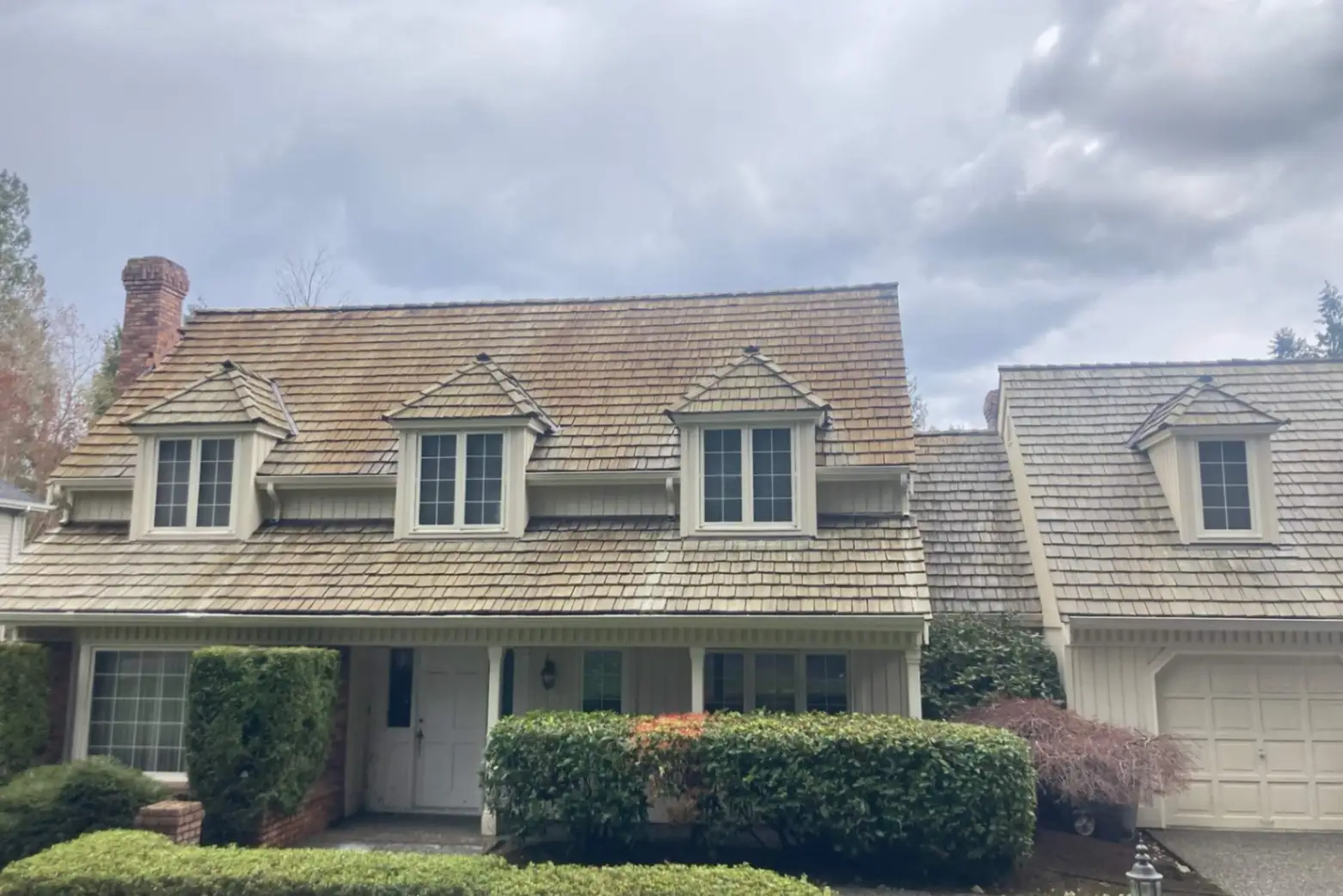 After professional house washing revealing a brighter and cleaner home exterior in Bremerton
