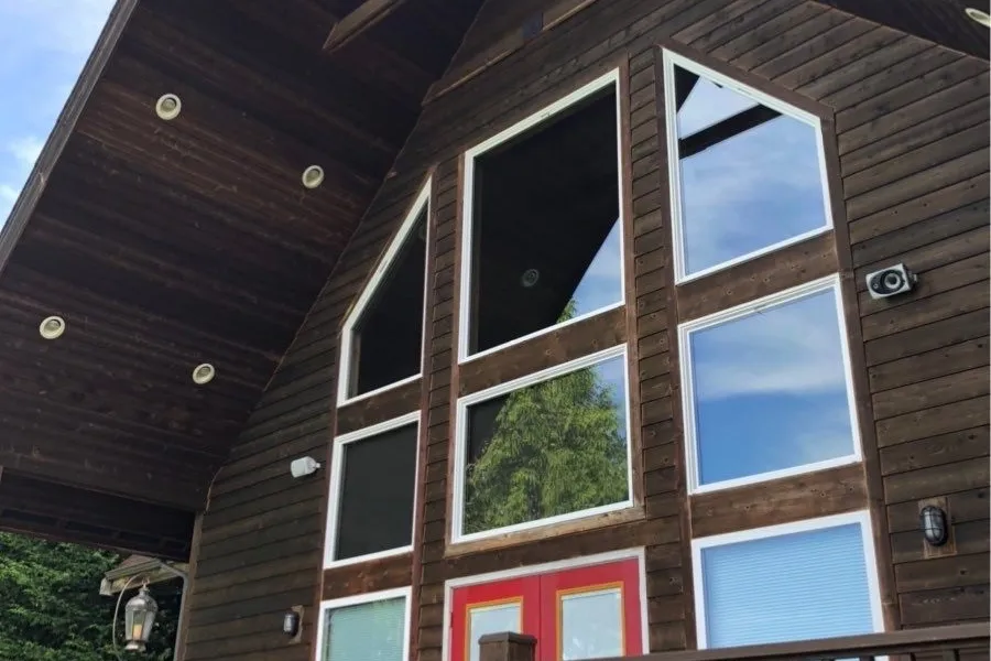 Residential window cleaning service removing dirt and buildup from home windows