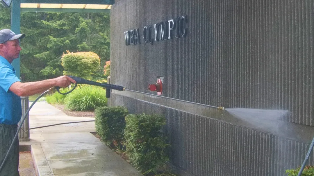 Commercial pressure washing service cleaning business walkways and exterior surfaces in Bremerton