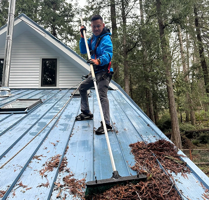 Regular Roof Cleaning by Johnny Tsunami Worker