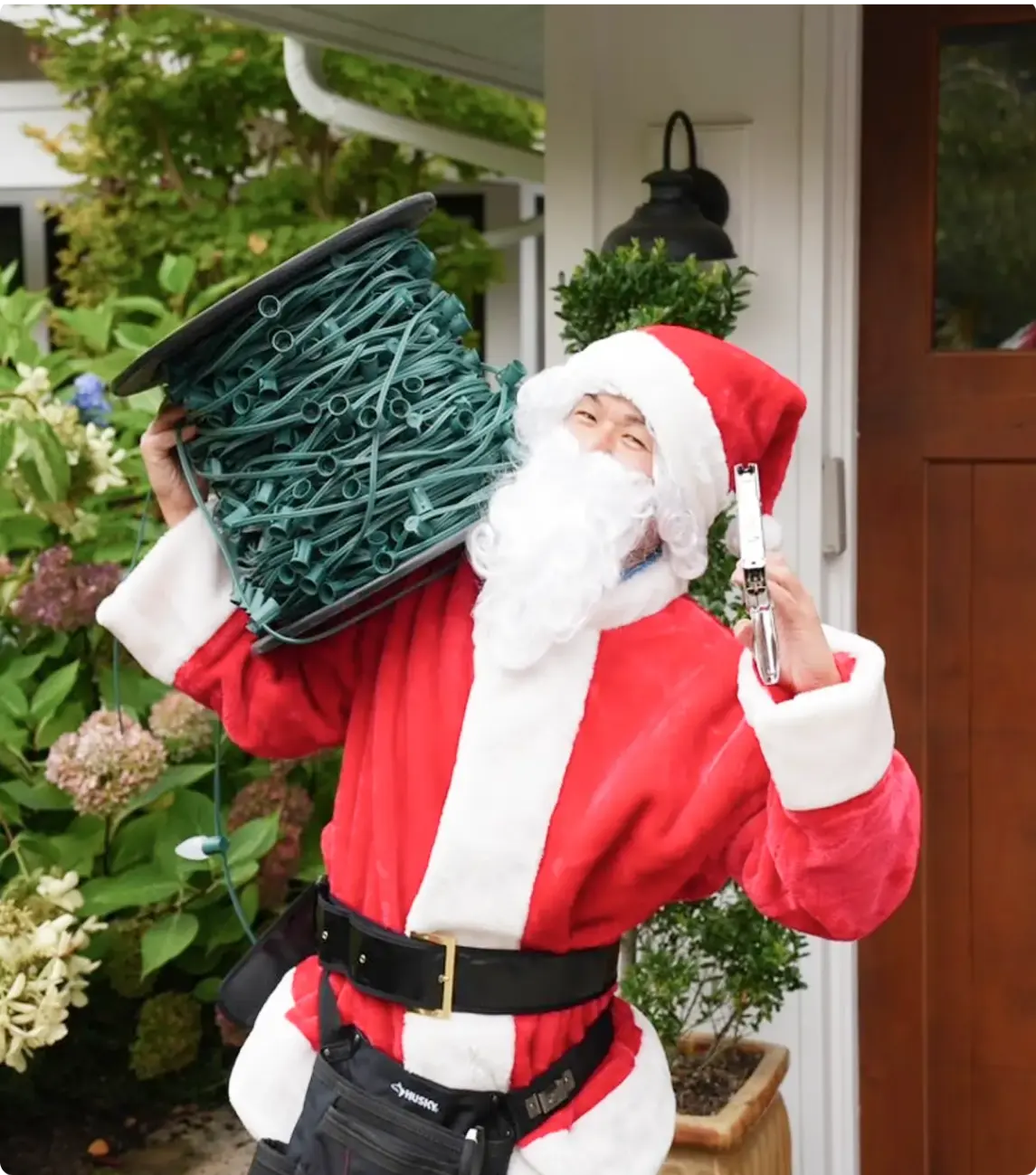Festive holiday lighting display with Santa decoration