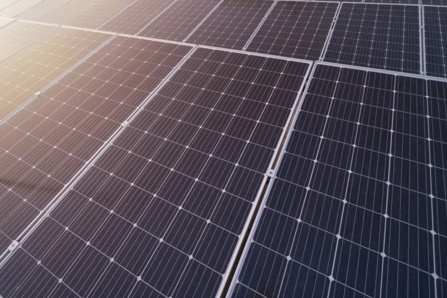Residential rooftop solar panels before professional cleaning
