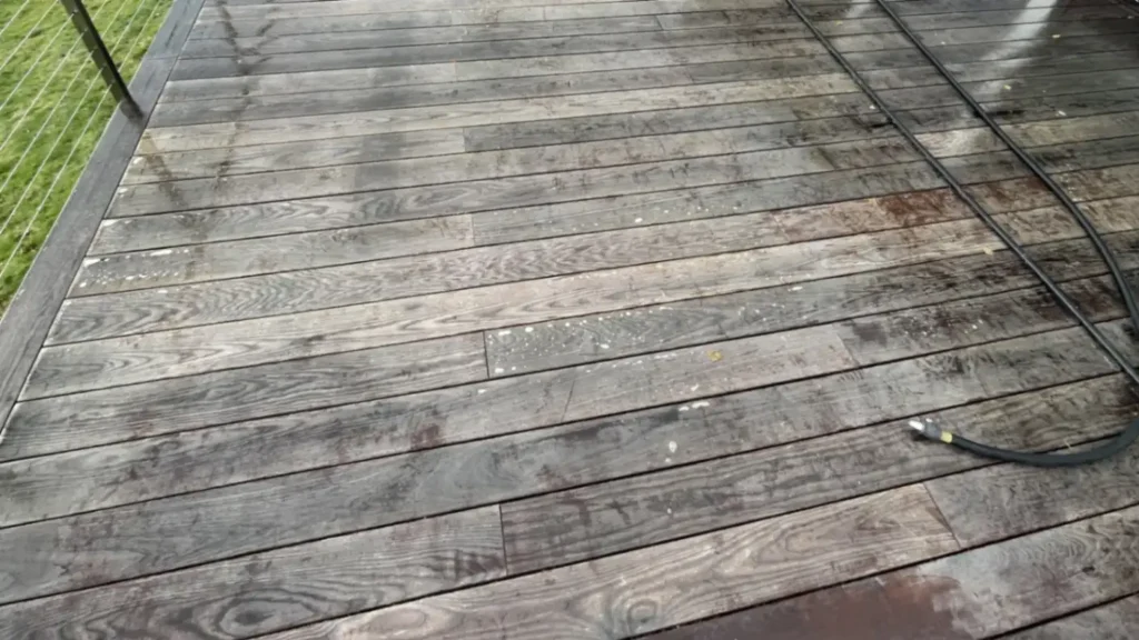 Before professional pressure washing wood deck surface in Bremerton